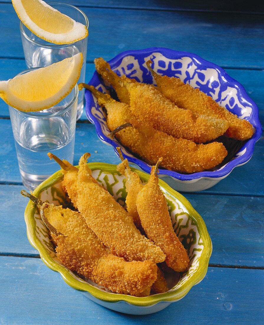 Breaded chili peppers with cheese stuffing