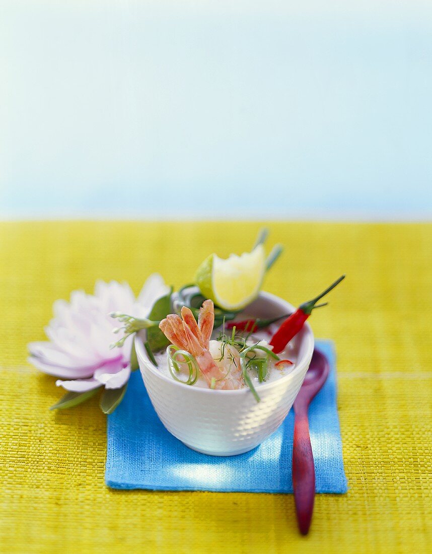 Coconut milk soup with shrimps and chili peppers