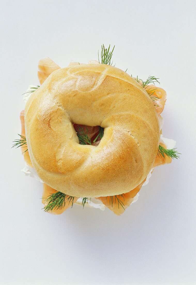 Bagel with soft cheese, salmon and dill