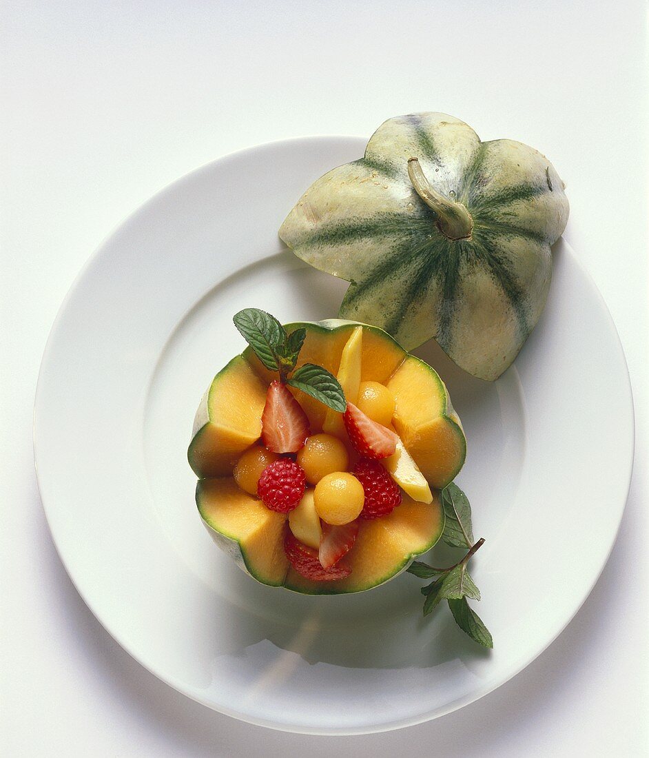 Melon and strawberry salad in hollowed-out Charentais melon