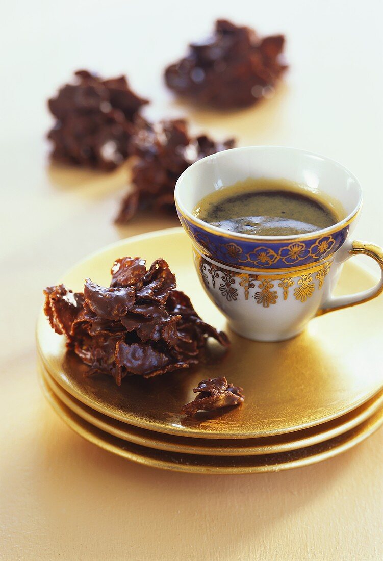Cornflake clusters with chocolate glaze & a cup of coffee 