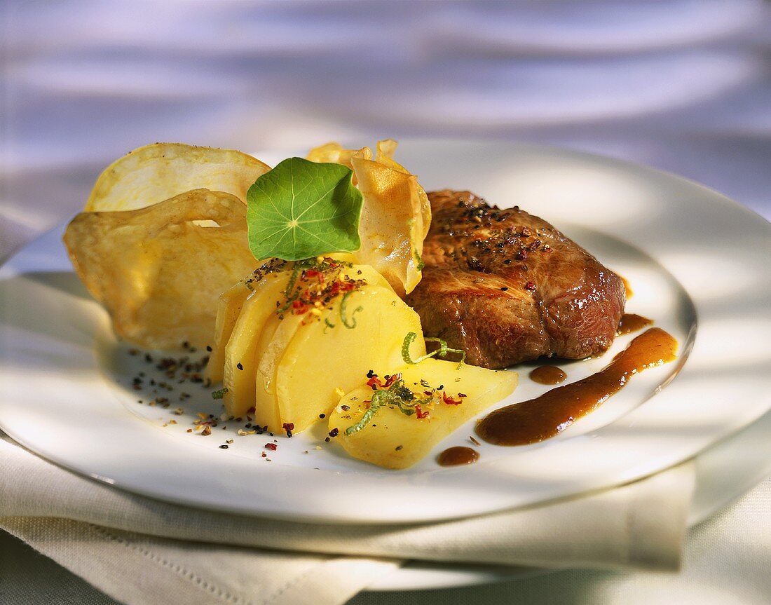 Stuffed ostrich steak with potatoes