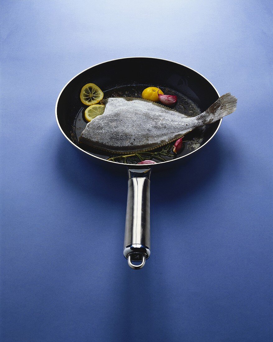 Plaice in a frying pan