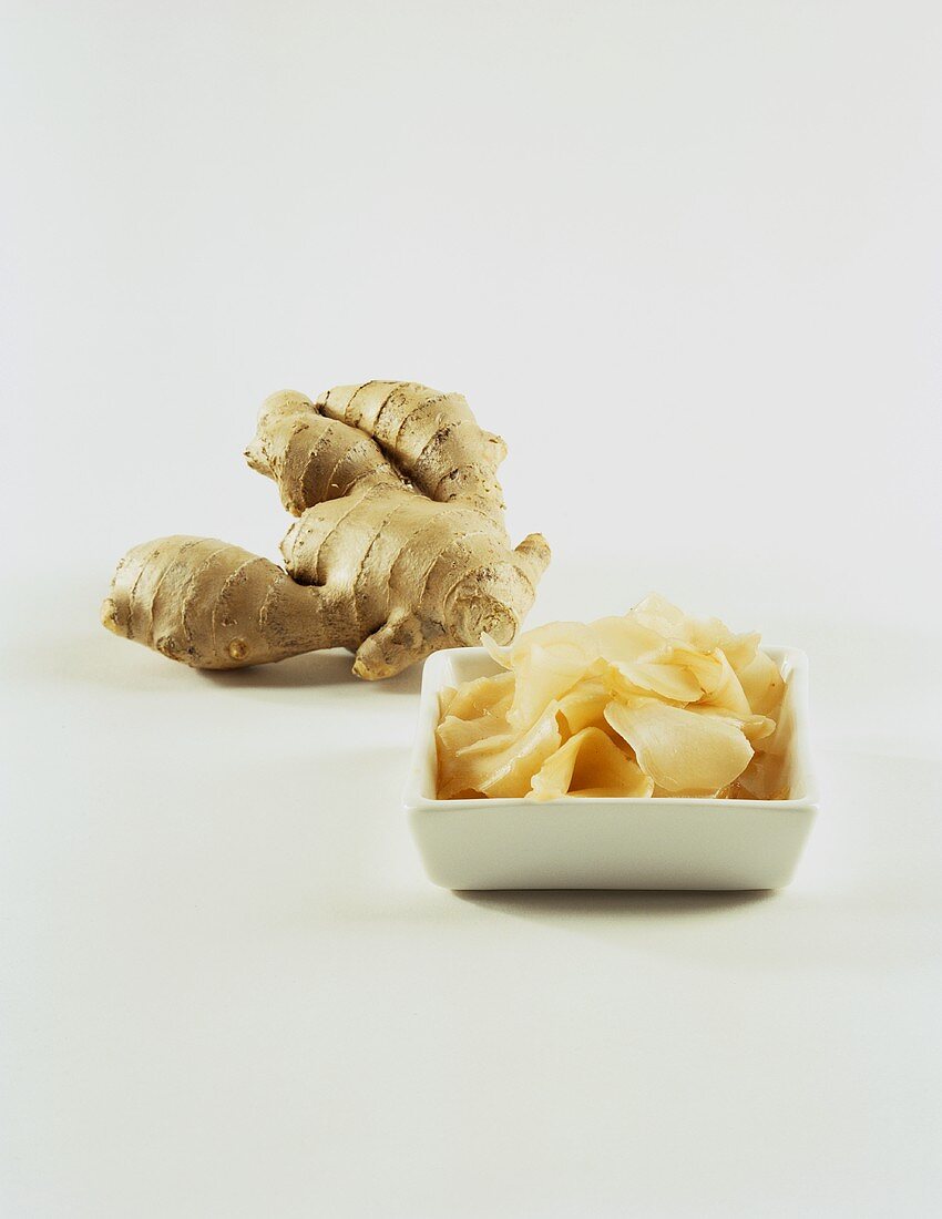 Ginger root and slices of preserved ginger