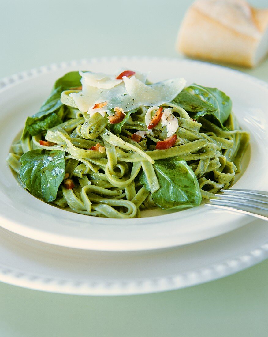 Green ribbon pasta with spinach and chili