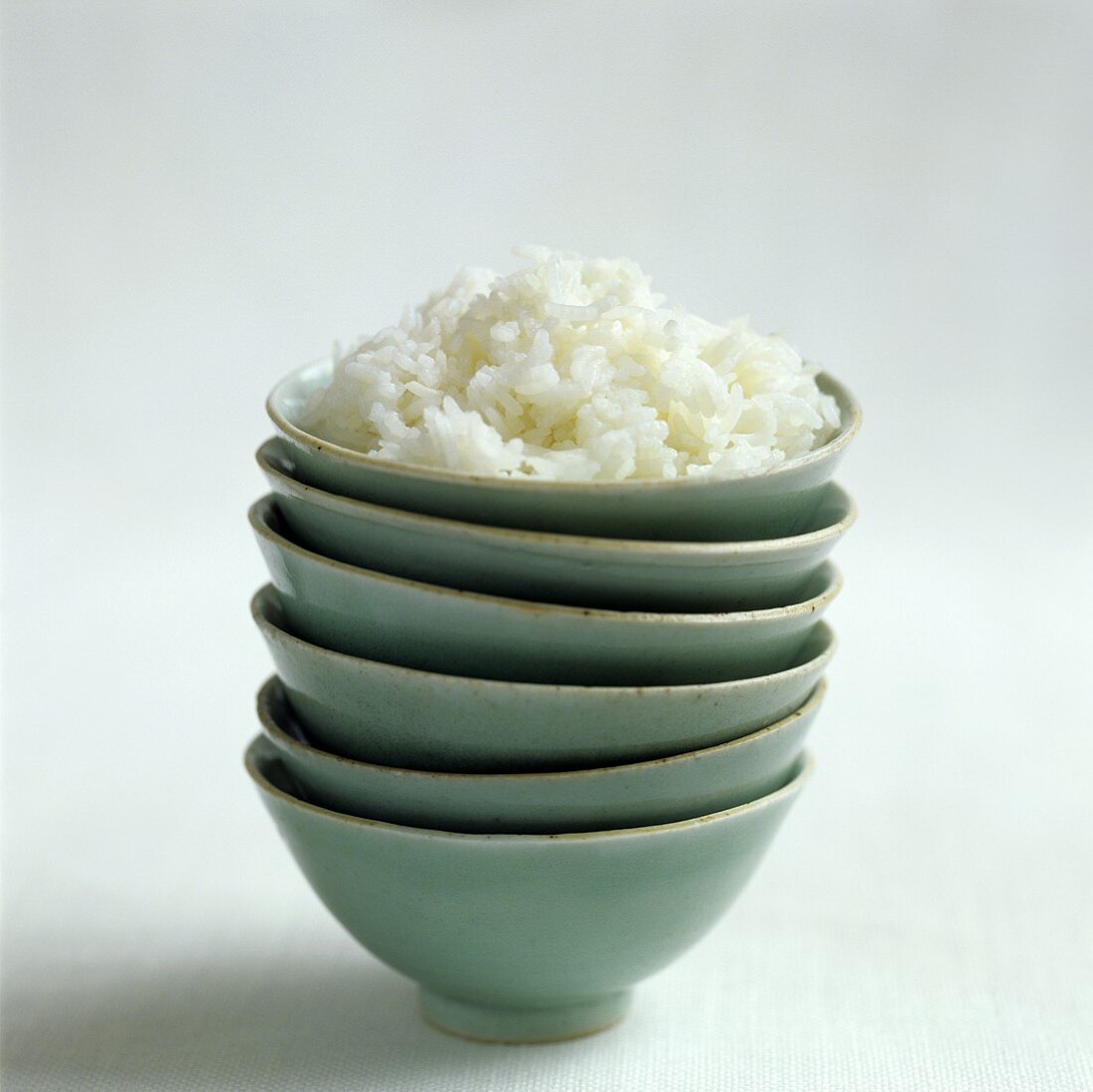 Bowl of rice on a pile of bowls