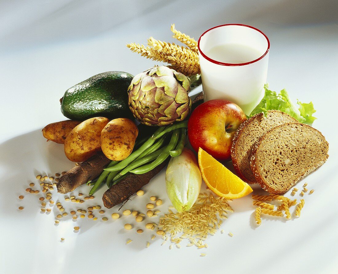 Still life with vegetables, fruit, bread, milk and cereals