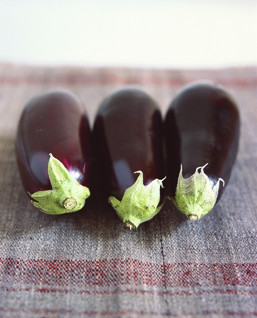 Three aubergines