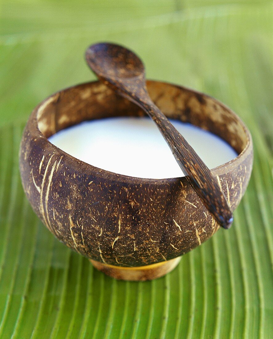 Coconut milk soup in a wooden bowl