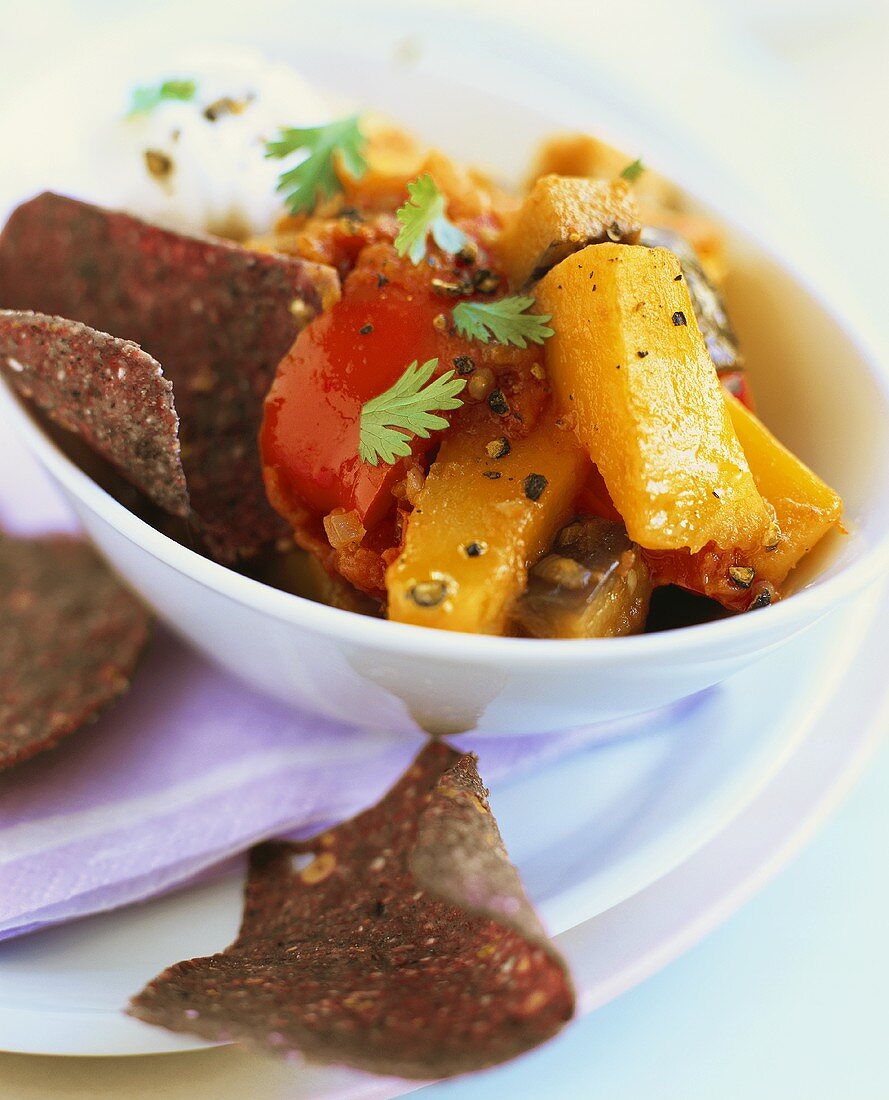 Vegetable stew with blue corn chips