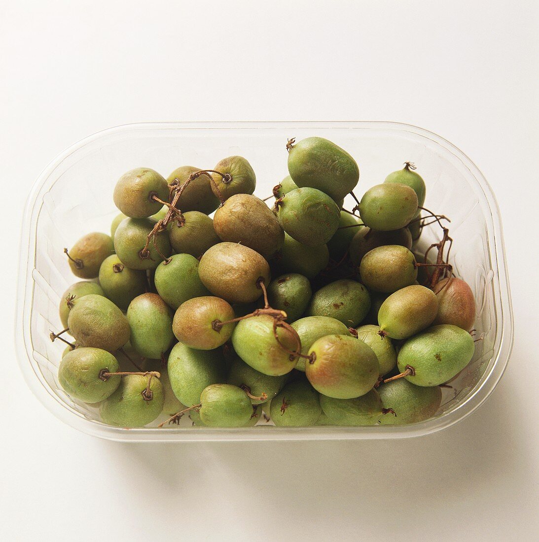 Weikis (Bavarian kiwi fruits) in plastic container