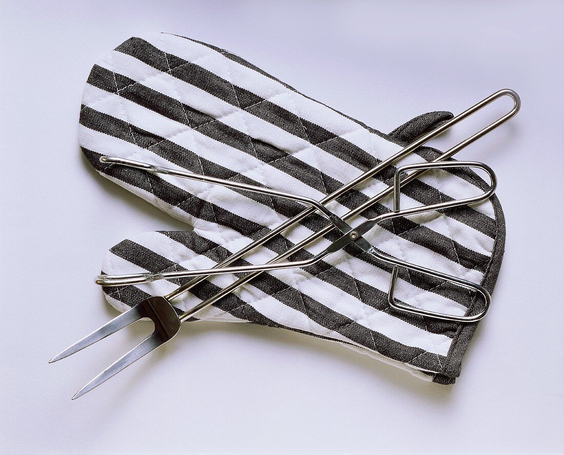 Barbecue tools with striped barbecue glove