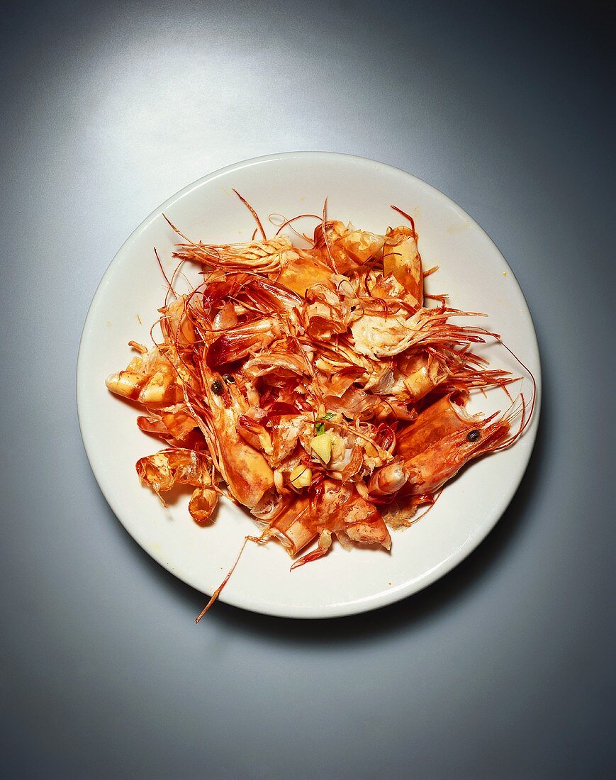 Remains of shrimps on a plate