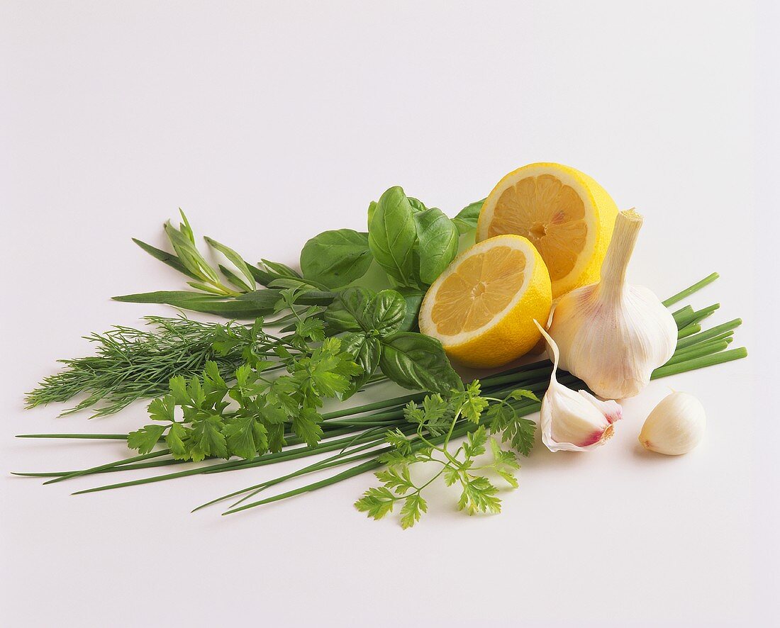 Fresh herbs, lemons and garlic