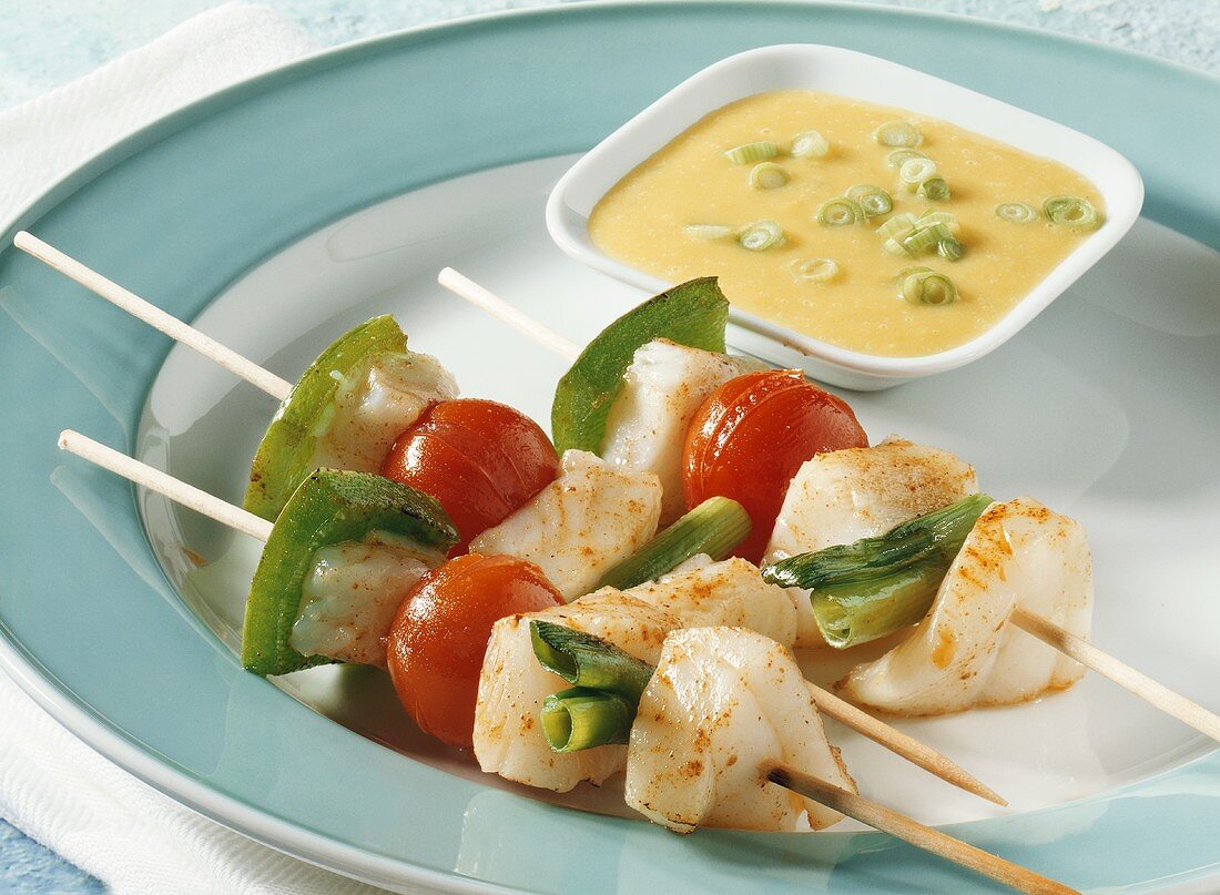Fish and vegetable kebabs with mango sauce