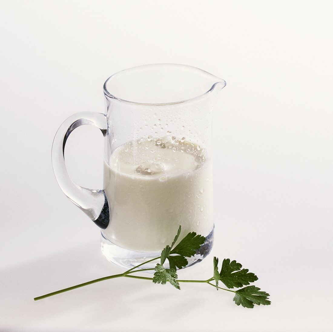 Jug of milk and parsley
