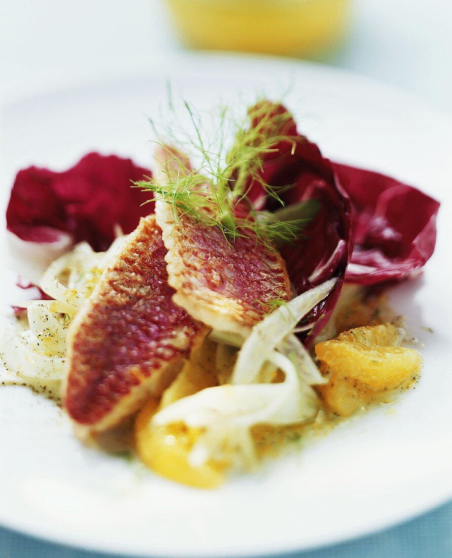 Red mullet with radicchio leaves and orange segments