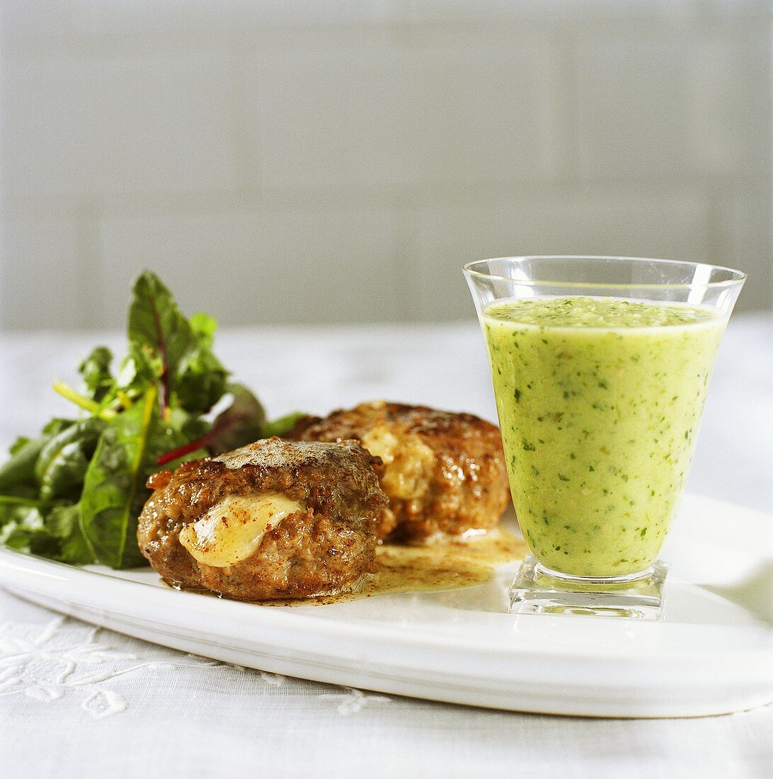 Meatloaf with cheese stuffing and herb sauce