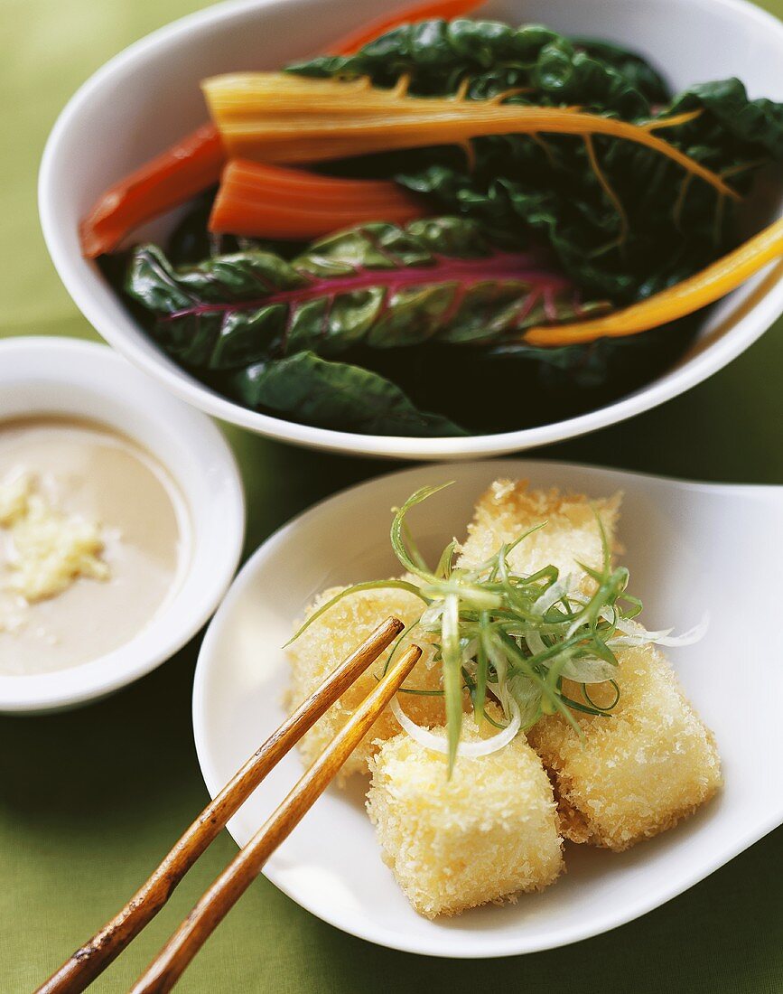 Deep-fried tofu cubes with rainbow chard