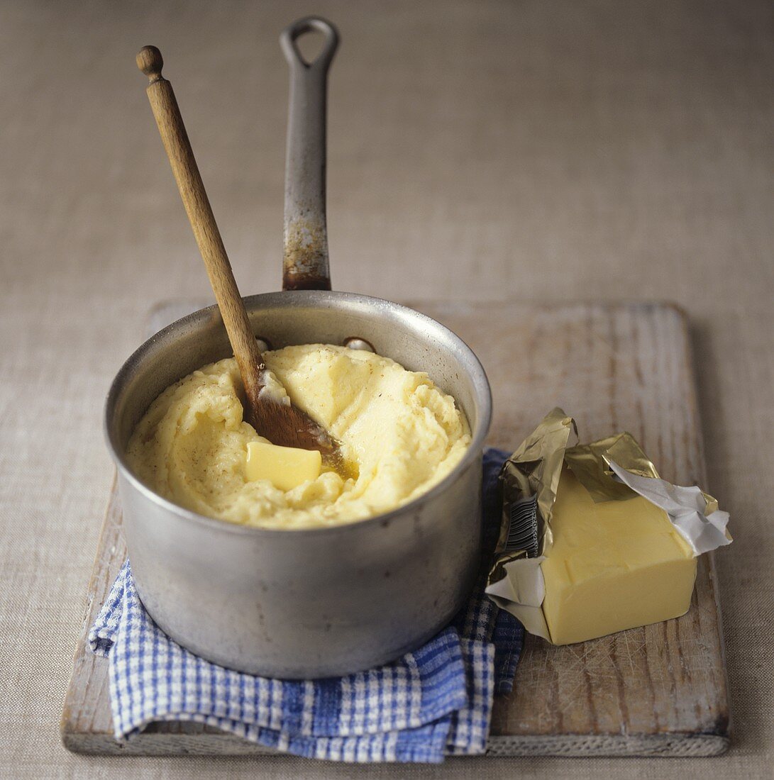 Mashed potato with butter in a pan