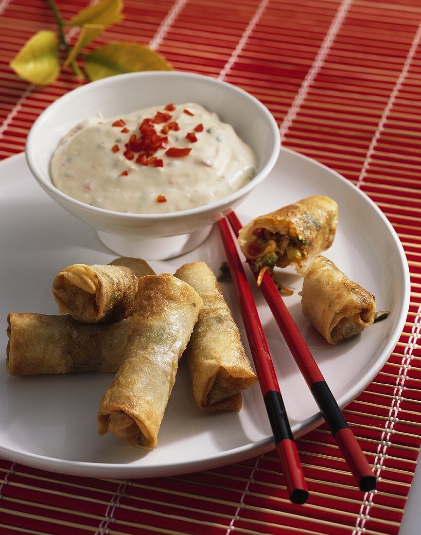 Spring rolls with spicy soft cheese dip