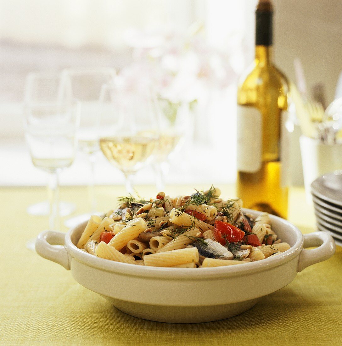 Rigatoni with herring, tomatoes and pine nuts