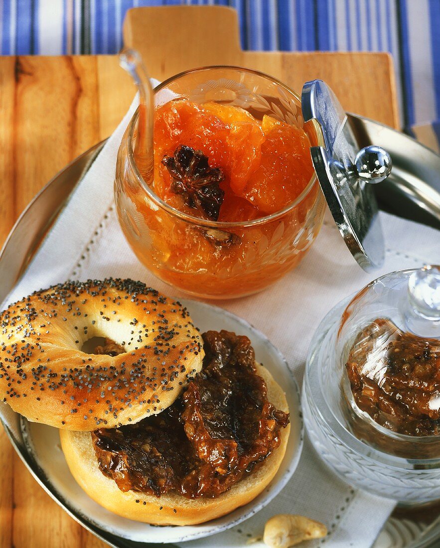 Poppy seed bagel with plum puree and apricot & tomato jam