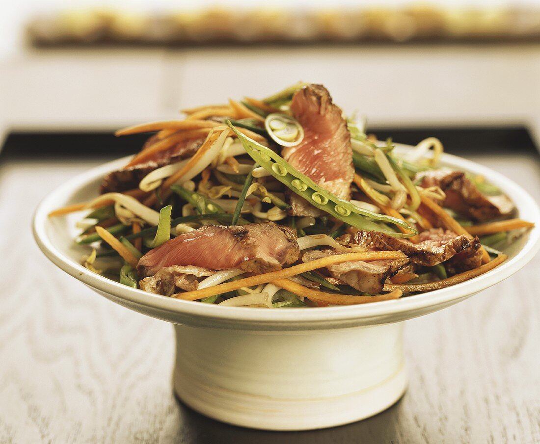 Veal salad with vegetables and sprouts