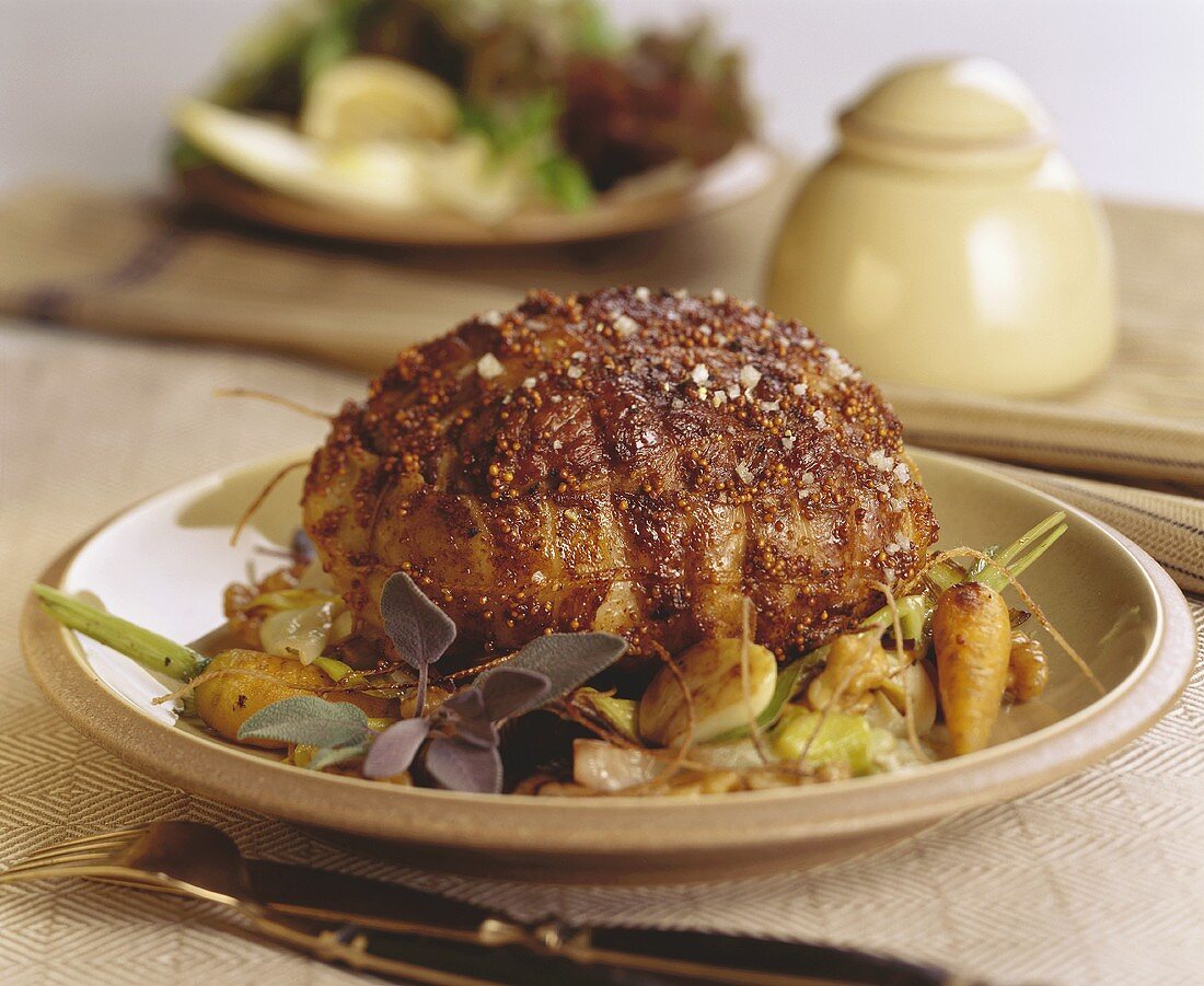 Roast veal with mustard seeds and vegetables