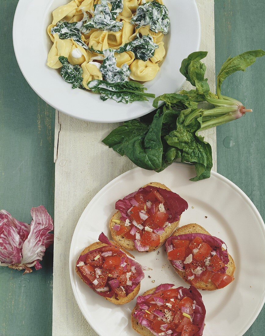Bruschetta with radicchio and tortellini with spinach