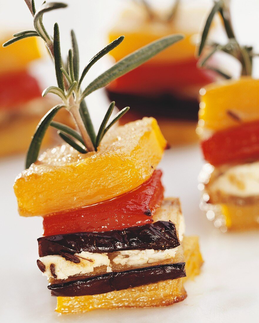 Pepper, aubergine and feta skewered on rosemary