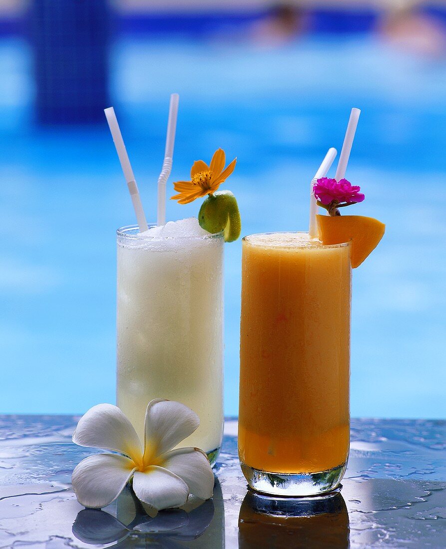 Two cocktails with flowers