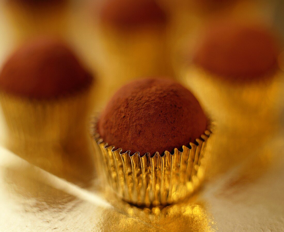 Chocolate truffles in petit four cases