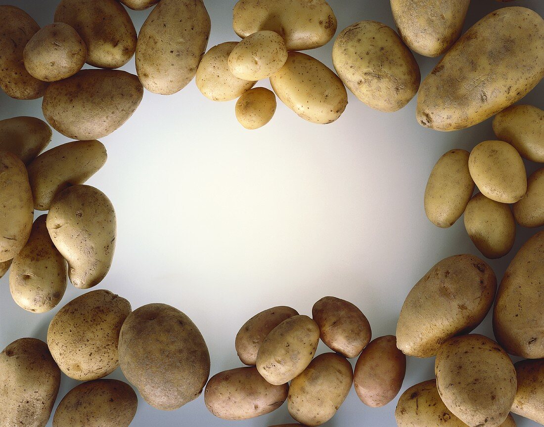 Potatoes arranged around the edge of the picture