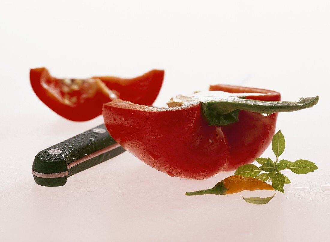 Red pepper with knife