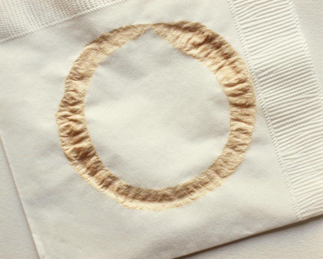 Paper napkin with impression of a coffee cup