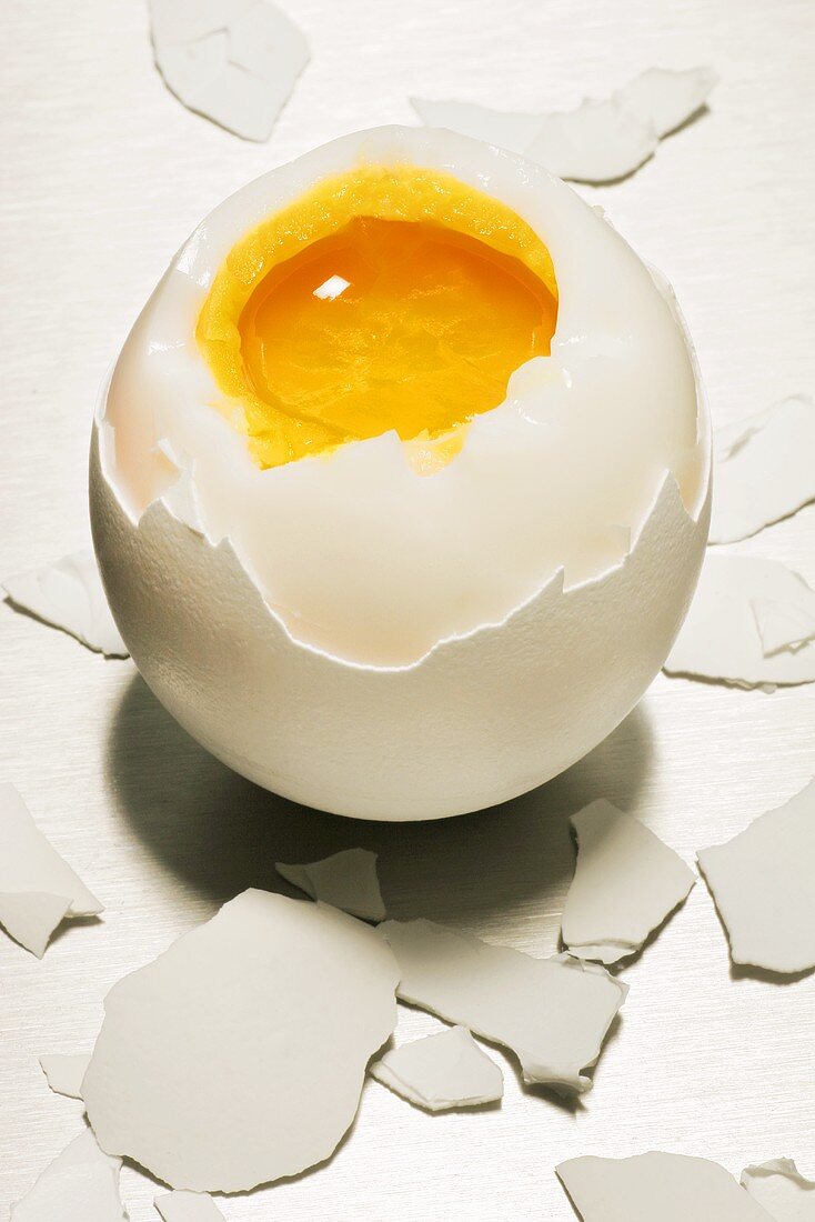 A soft-boiled egg, broken open