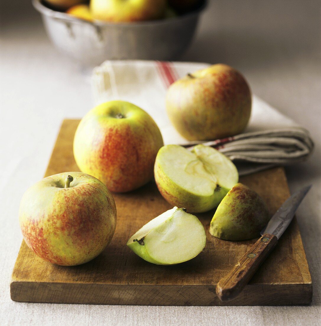 Apples, whole and cut open (Cox's orange pippin)