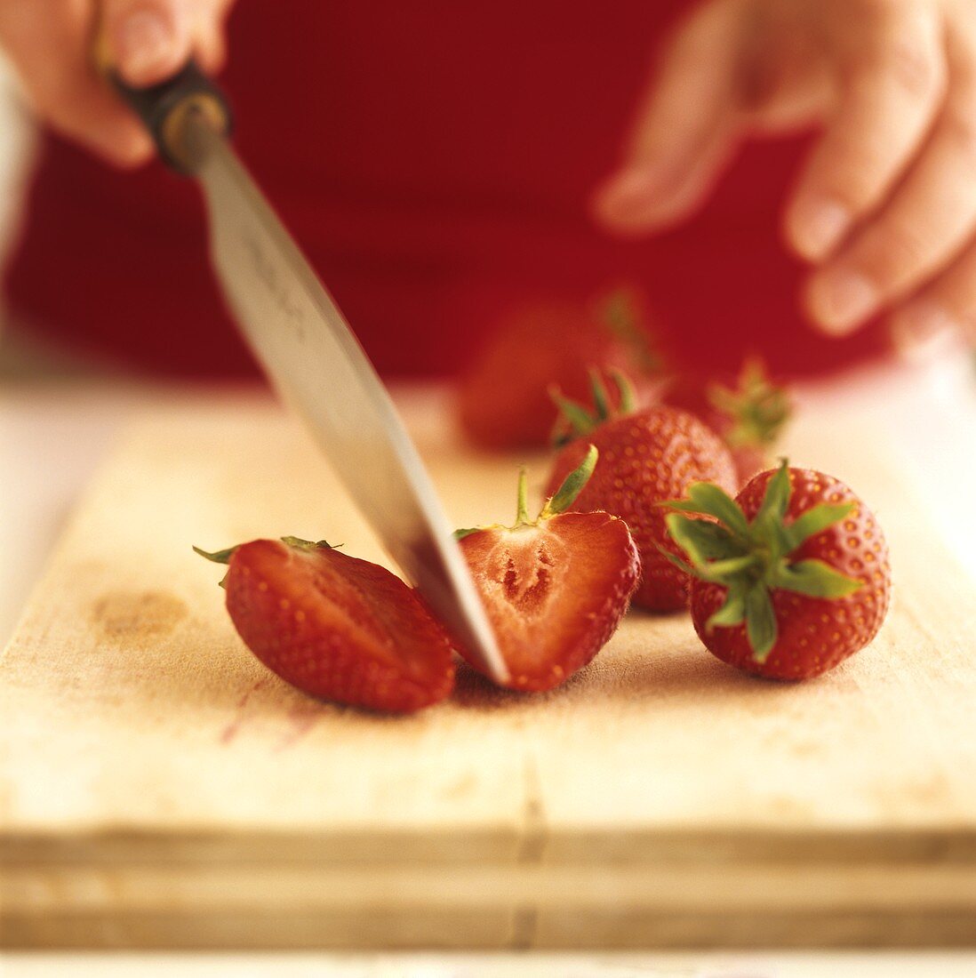 Cutting a strawberry