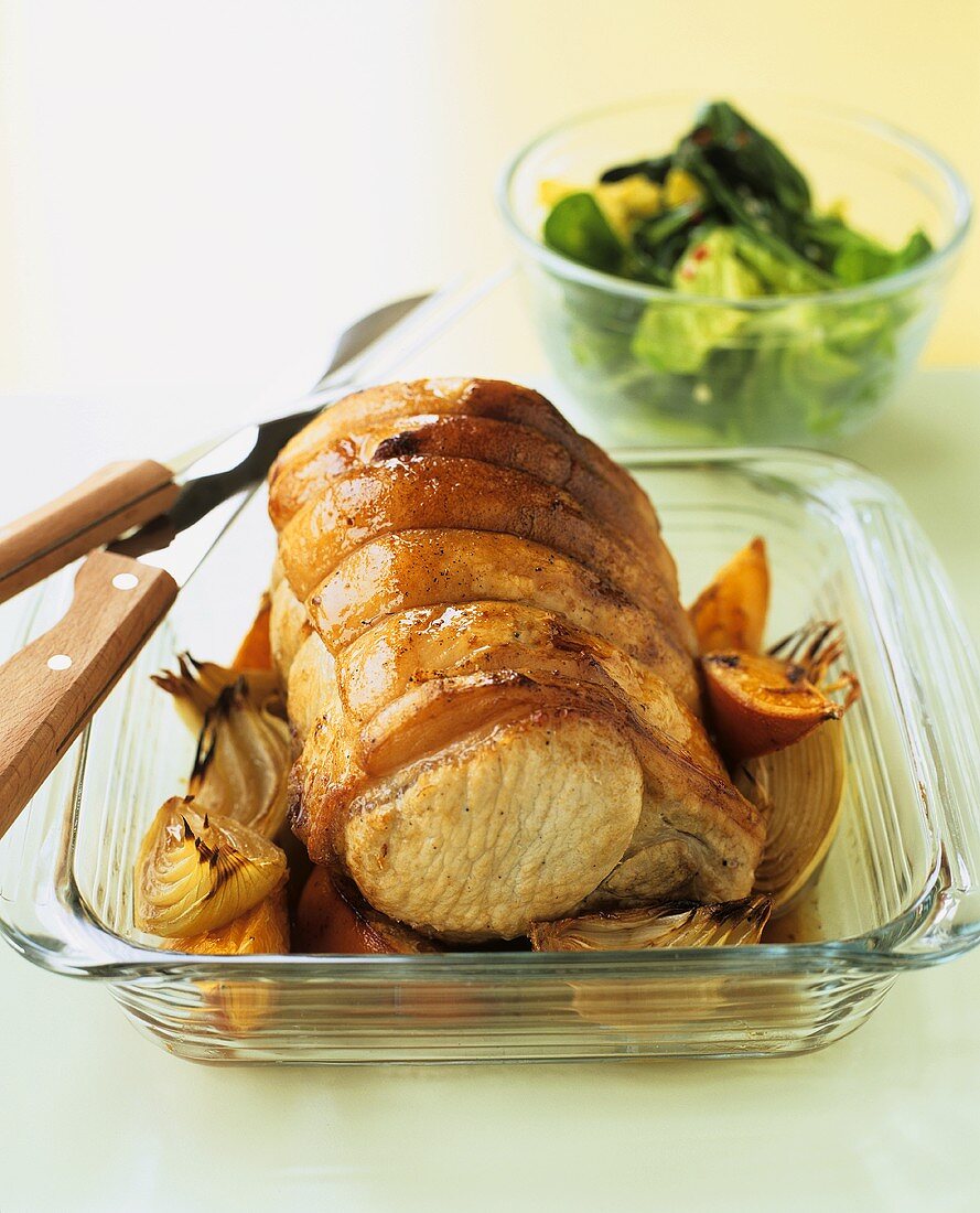 Roast pork on vegetables