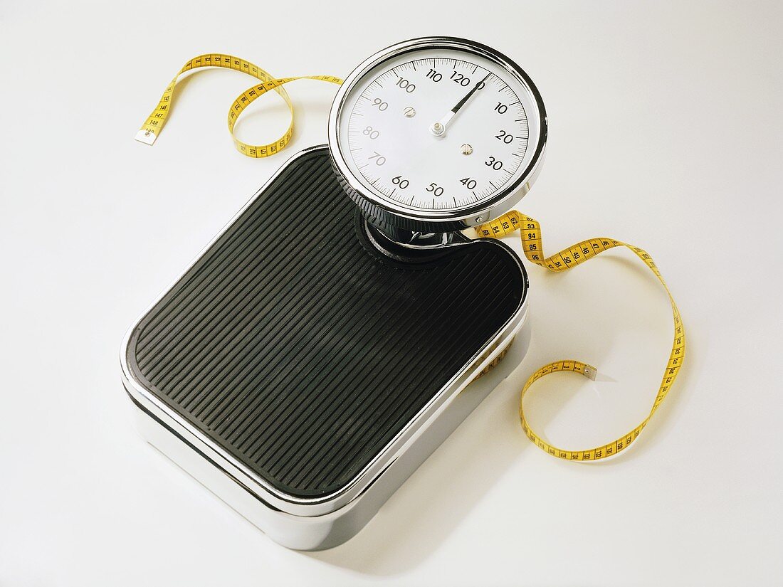 Bathroom scales with tape measure