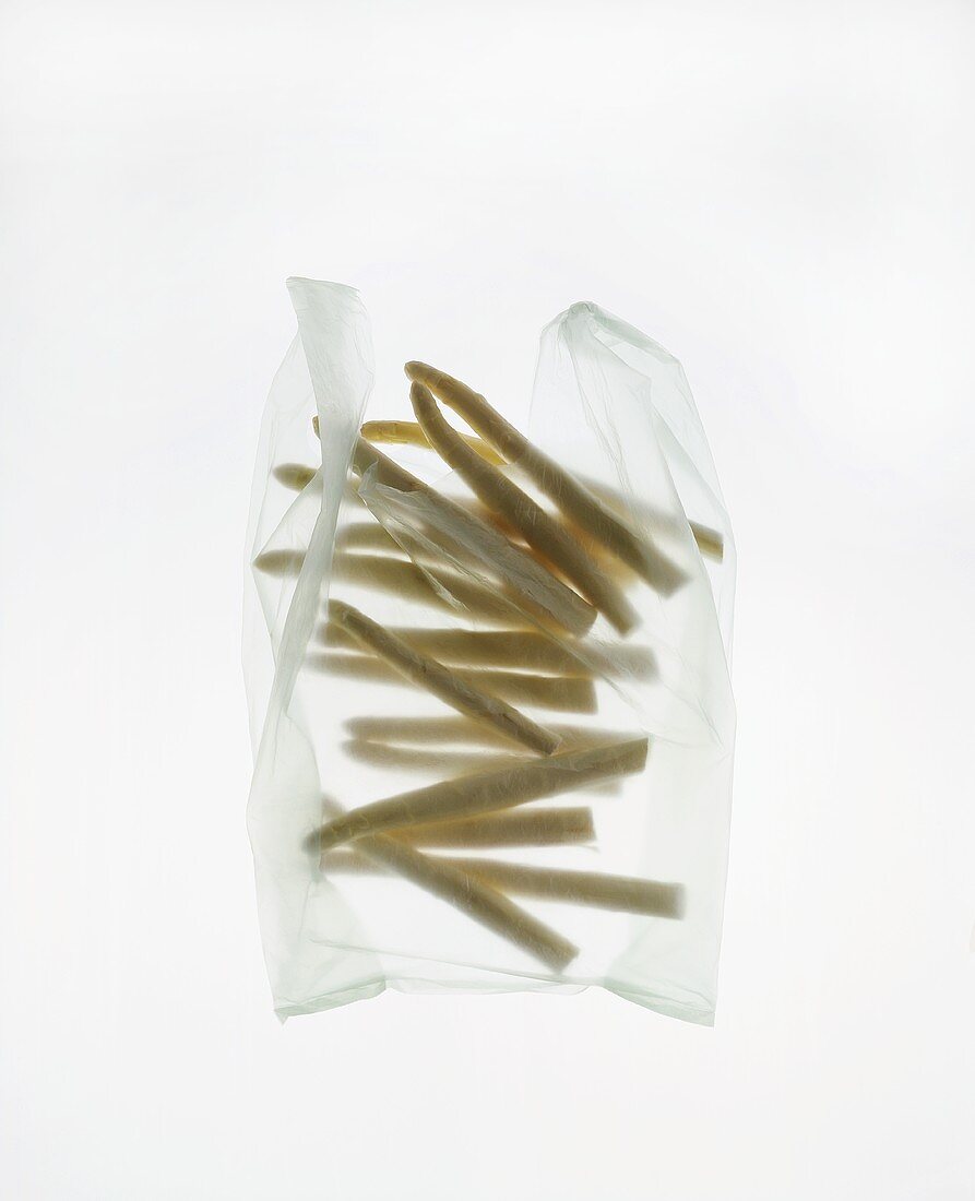 White asparagus spears in plastic bag
