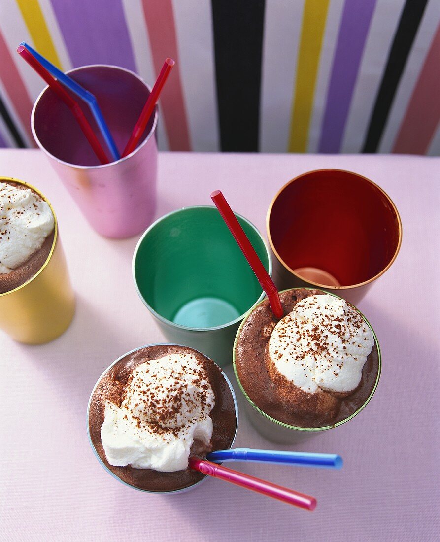 Hot chocolate in coloured mugs