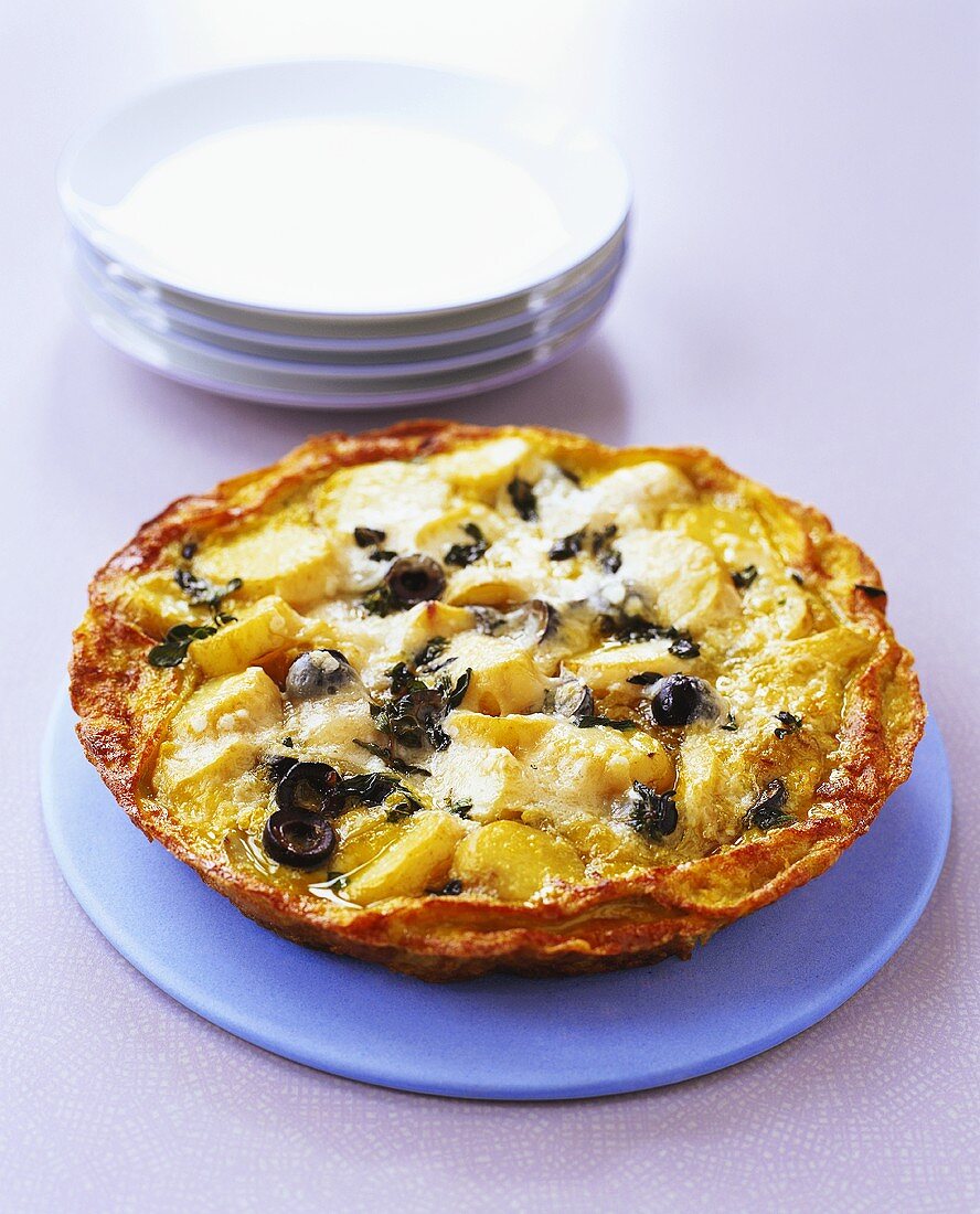 Potato tortilla with olives and marjoram