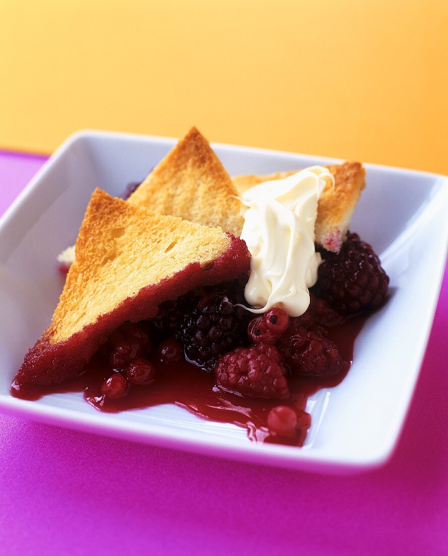 Berry compote with toast triangles and clotted cream