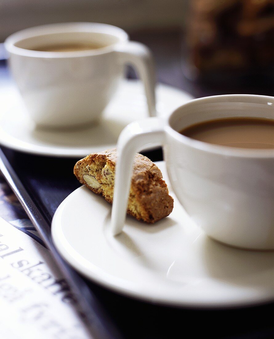 Two cups of coffee with cantucci