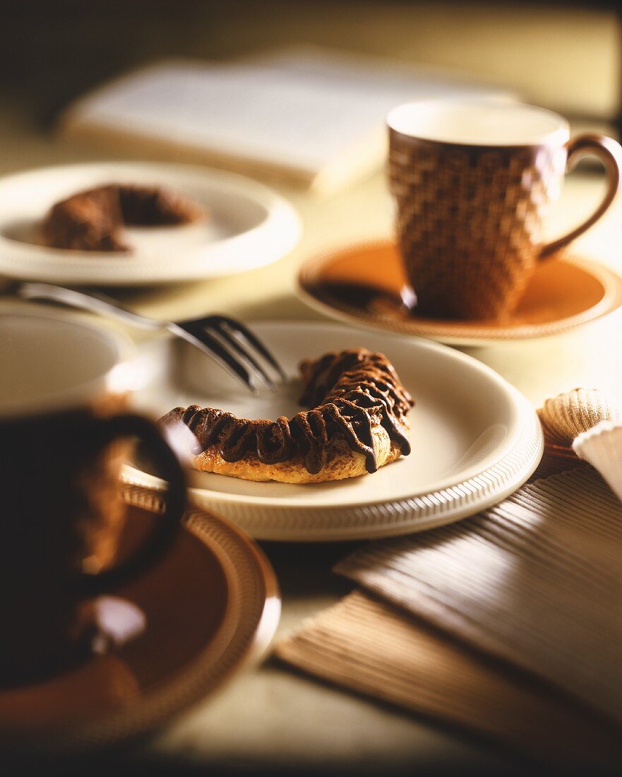 Chocolate croissant with coffee