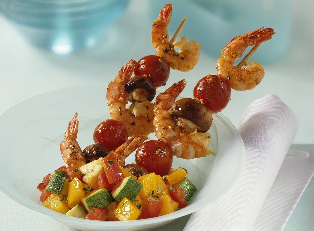 Shrimp kebabs with vegetable salad