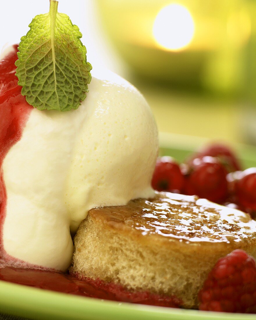 Savarin with vanilla ice cream and raspberries