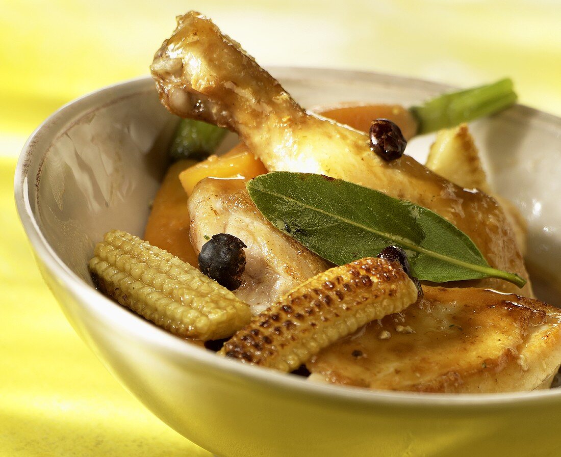 Chicken legs with fried baby corncobs